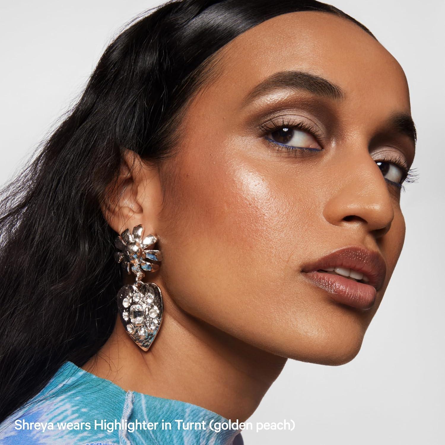 imageMilk Makeup Highlighter  Cream Highlighter Stick for Face  Body with Radiant Shimmery Glow  Buildable Blendable Vegan Formula for All Skin TypesTurnt  Golden Peach